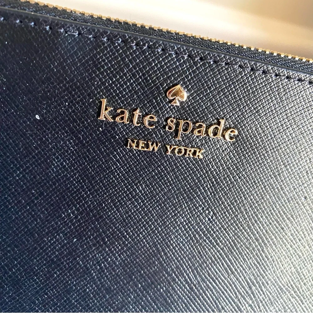 Kate Spade NWT Lucy Saffiano leather L Zip wristlet new with tags & factory wrap